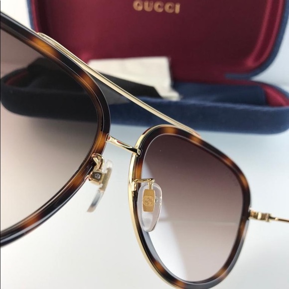 GUCCI Brown Gradient Sunglasses
GG0062S 012 57 - Picture 6 of 15